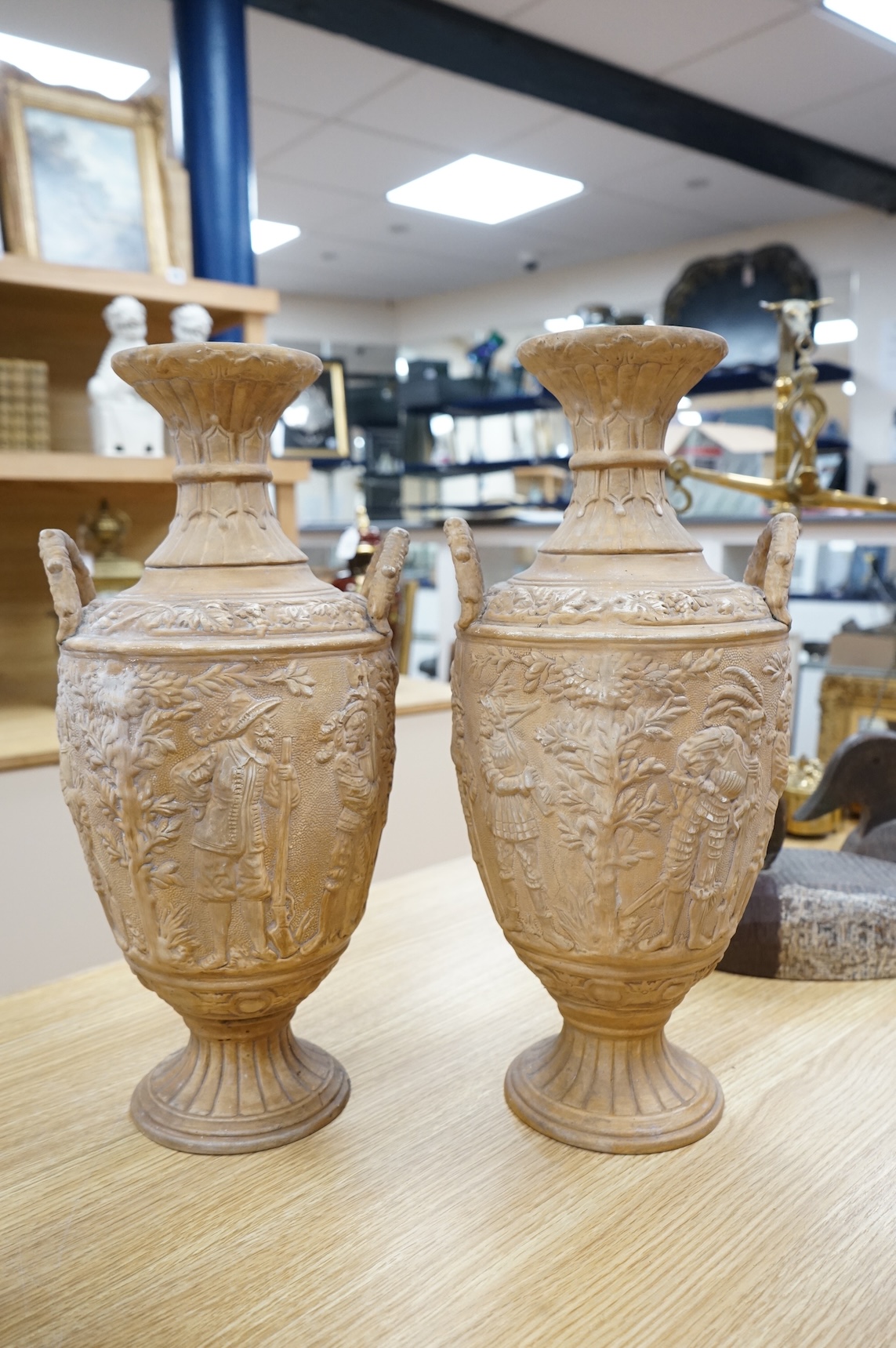 A pair of Grand Tour plaster two handled neoclassical revival vases H 43cm x 20cm